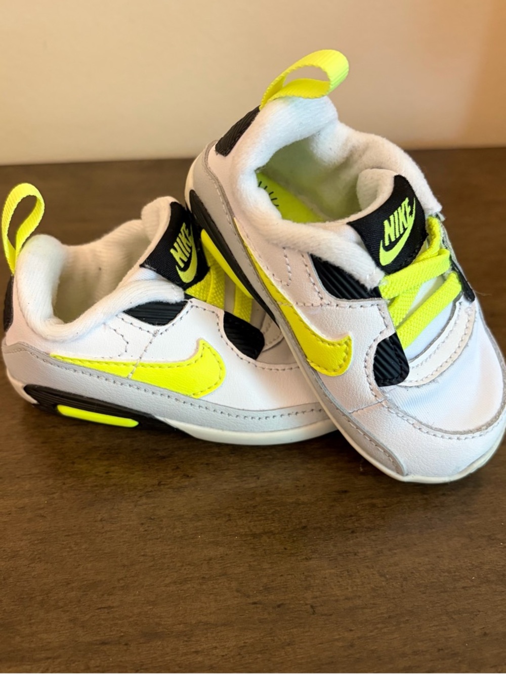 Nike Air Max 90 Crib in the White, Volt, and Black colorway size 4C